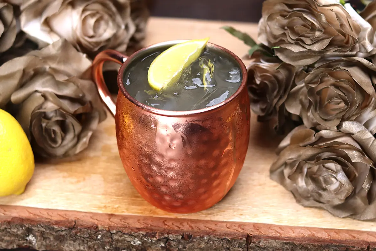 Stoli Toronto Mule cocktail in a copper mug with lemon garnish, featured in Wine Rack’s Oktoberfest drinks deals 2025